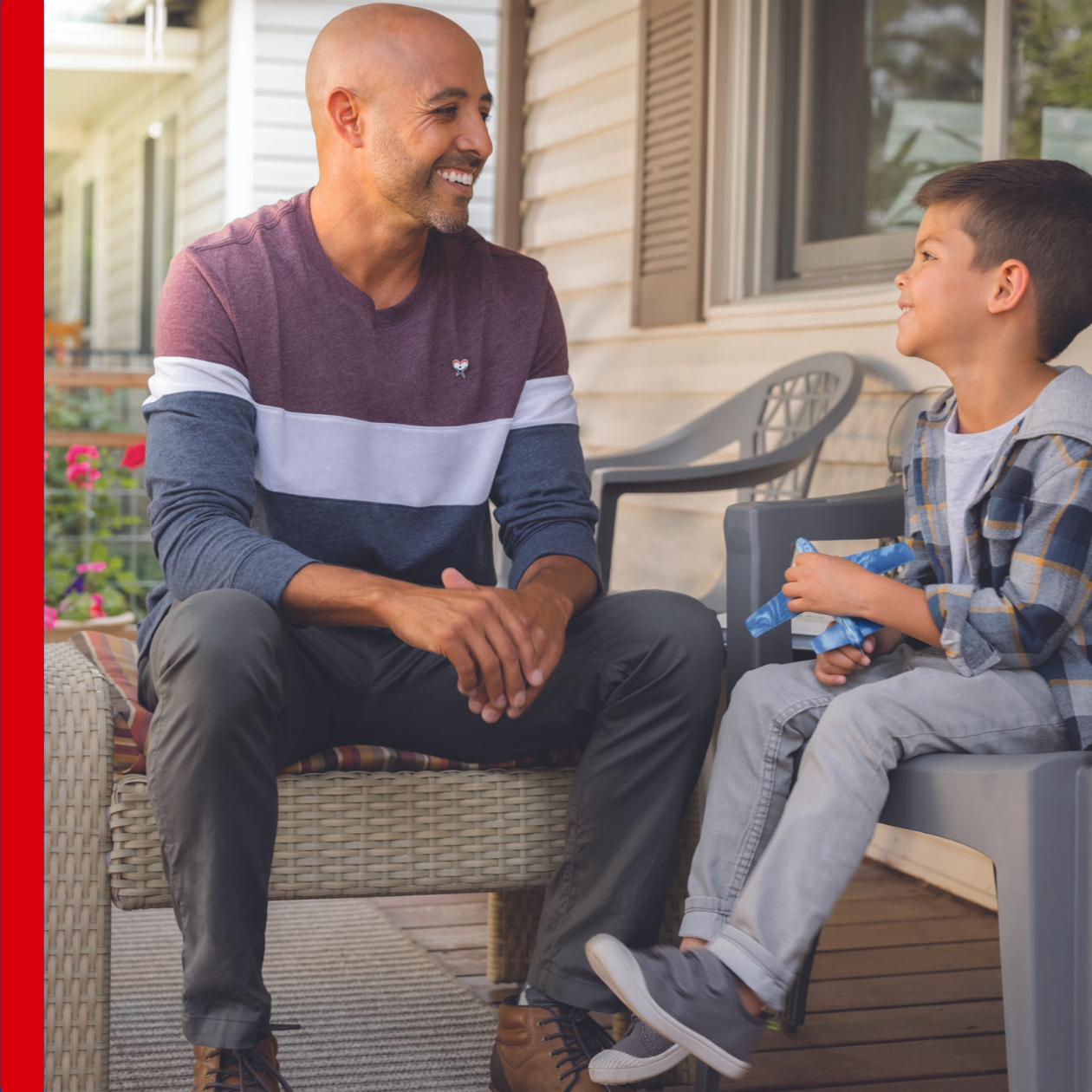 Adult and child sitting on front porch together, blog header
