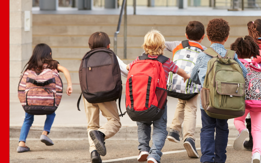 children at crosswalk with backpacks, blog header