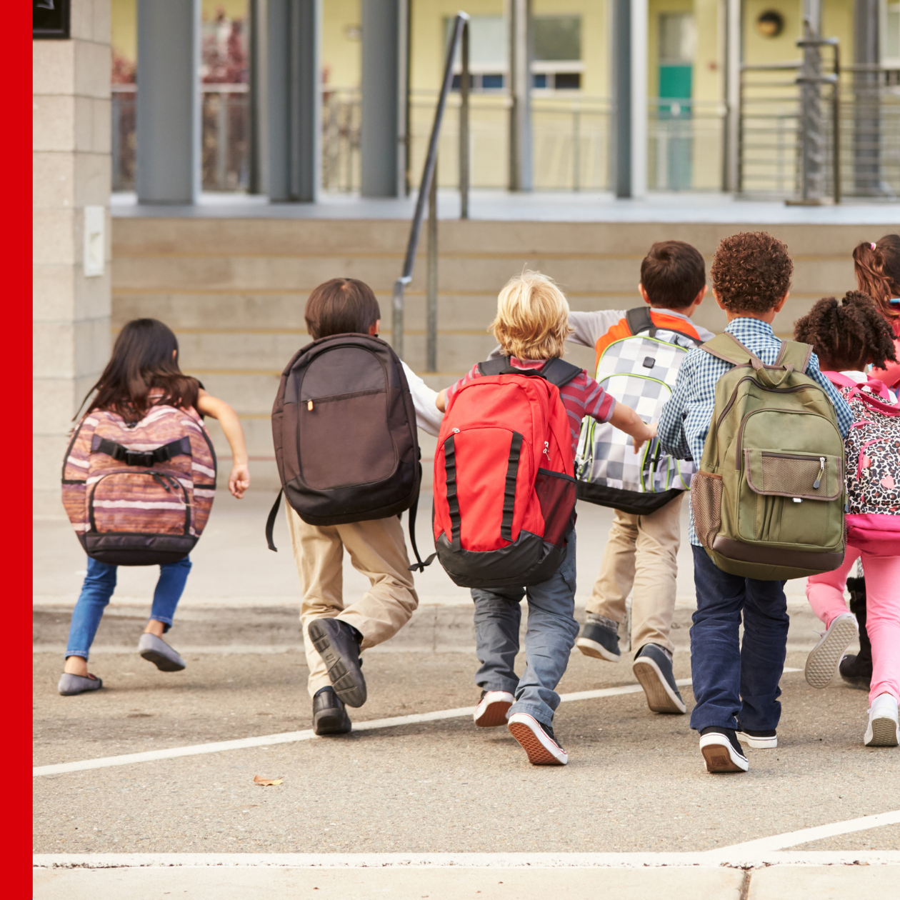 children at crosswalk with backpacks, blog header