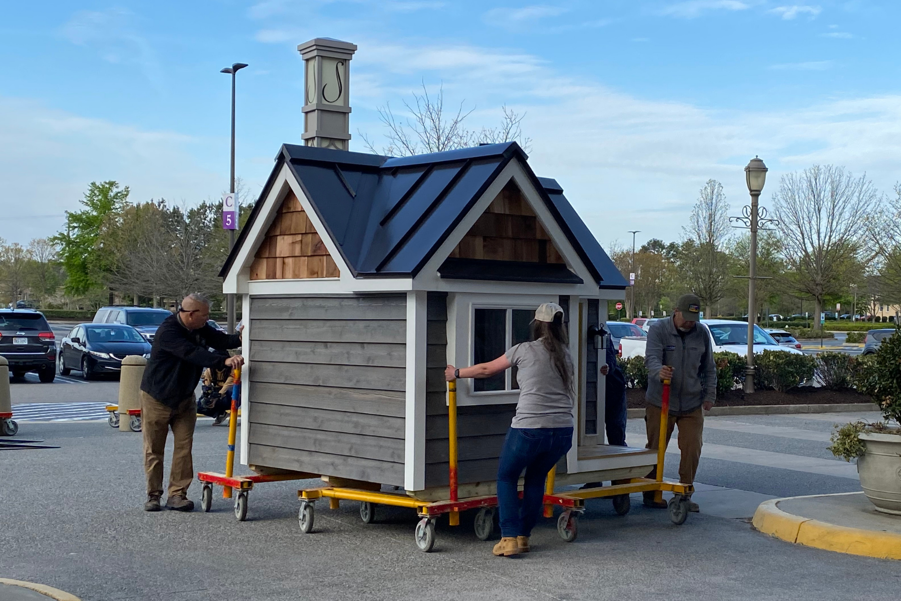 classic playhouse being delivered