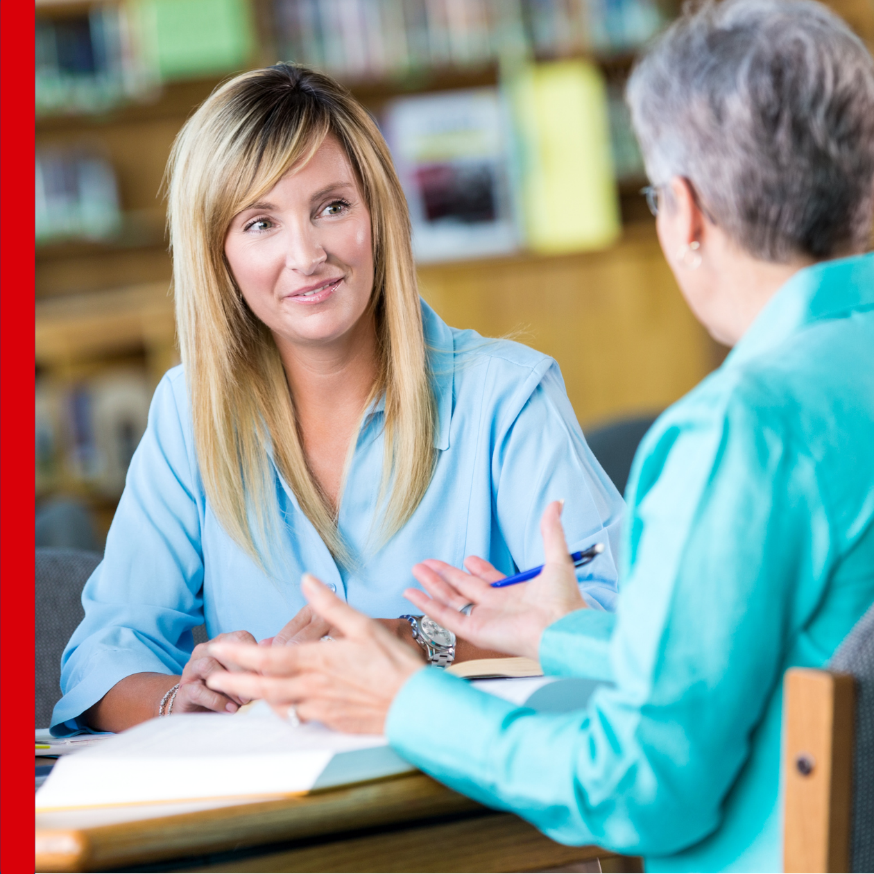 adults speaking together at table, blog header